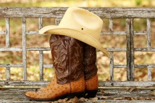 Cowboy Boots And Hat On Bench