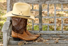 Cowboy Hat And Boots On Bench