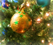 Gold Ornament With Green Stars