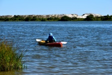 Person Kayaking On The River
