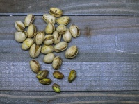 Pistachios On Wood Table