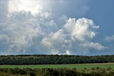 Storm Clouds Over Hills