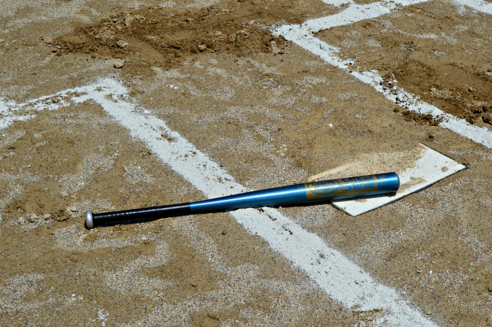 Bat On Baseball Field