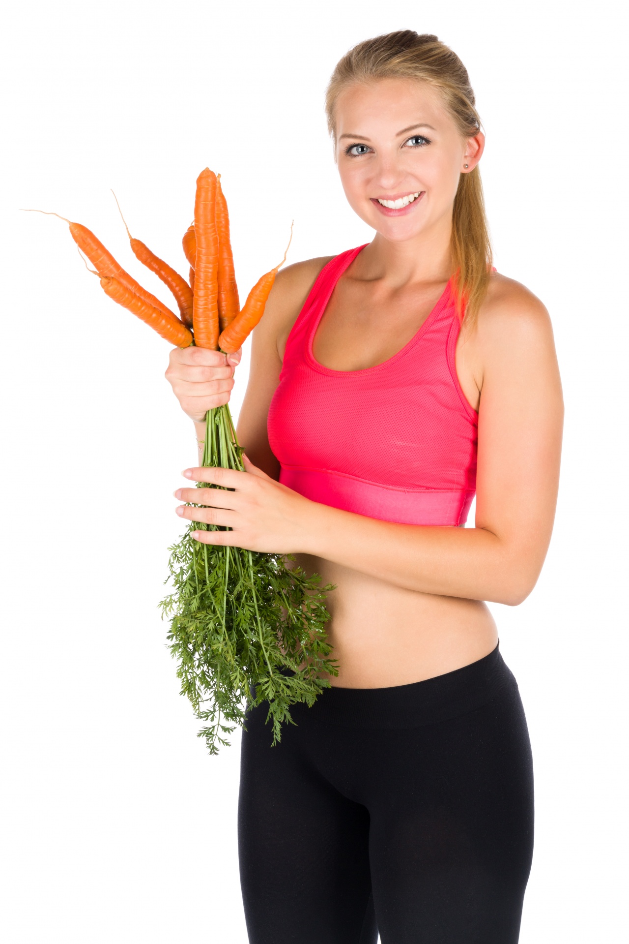 Young healthy woman holding bunch of carrots isolated on white background