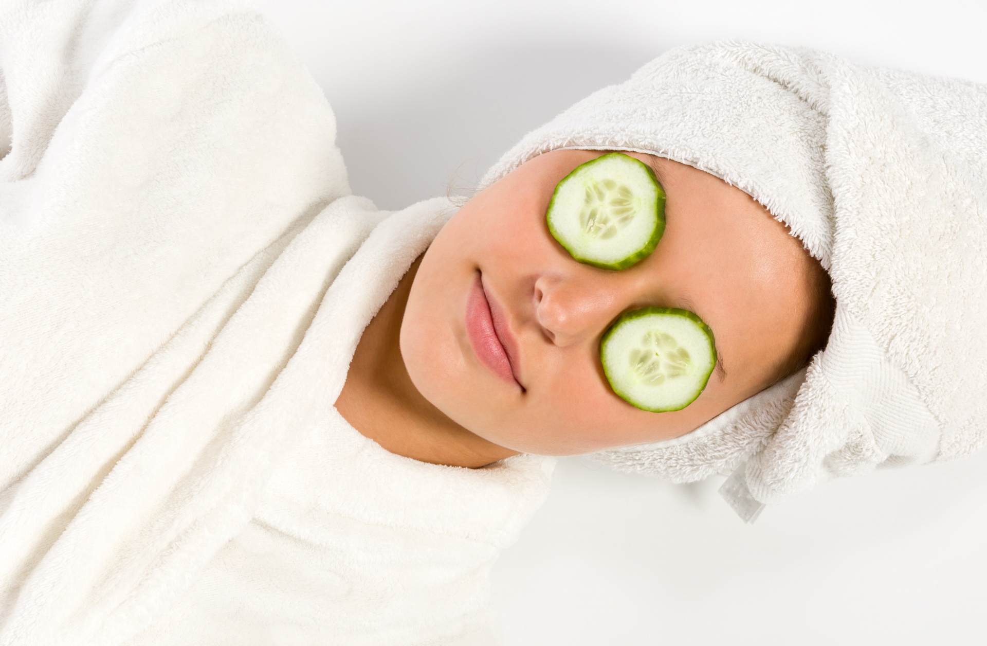 Woman With Cucumber On Eyes