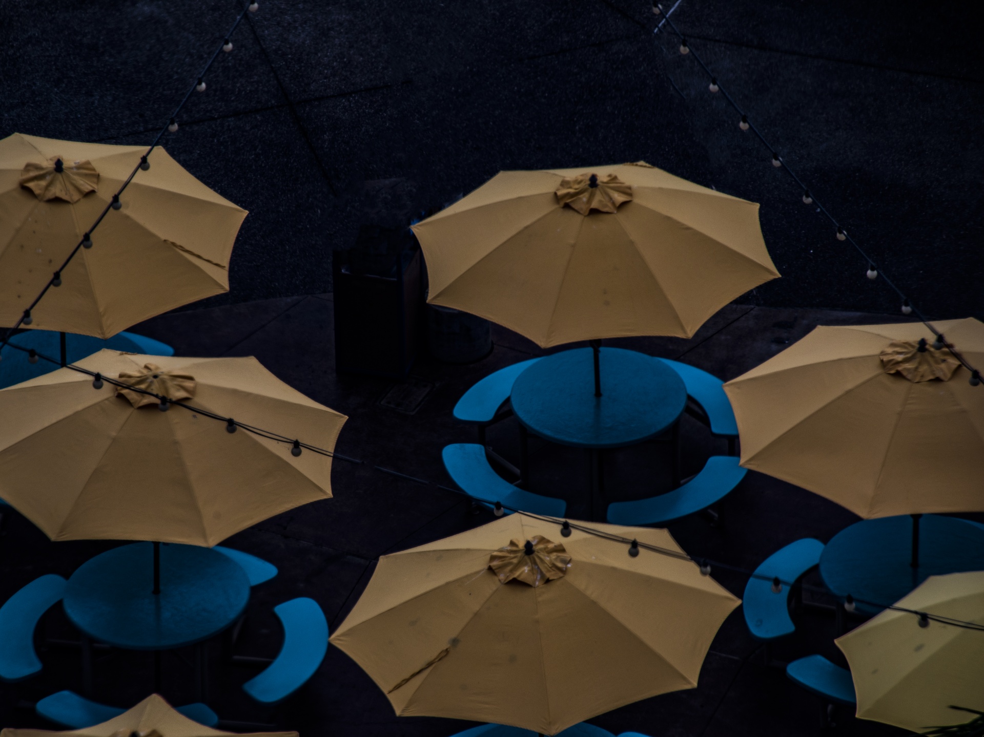 View from above, umbrellas and tables