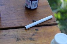 Cigarette And Paint On The Table