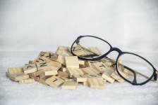 Glasses And Scrabble Tiles