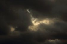 Glimmer Of Light In Dark Clouds