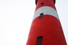 Lighthouse Against Bleak Sky