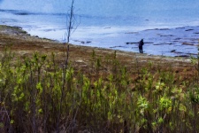 Man Fishing By Lake