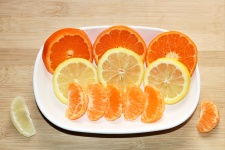 Orange And Lemon Slices On Plate 2