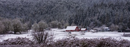 Red Barn In White Snow
