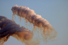 Remnant Smoke Of Flare From C-130