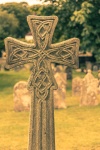Stone Cross At Cemetery