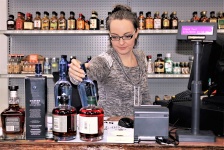 Woman Working In Liquor Store