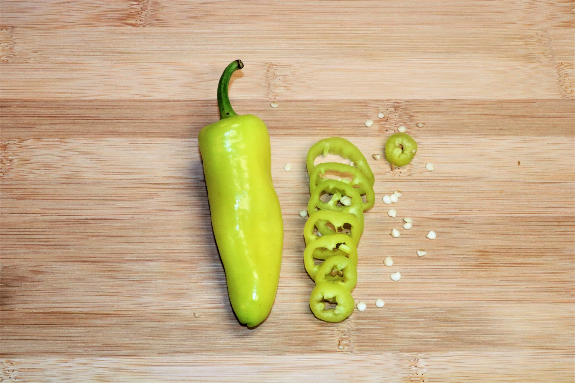 Banana Peppers On Wood Background 2