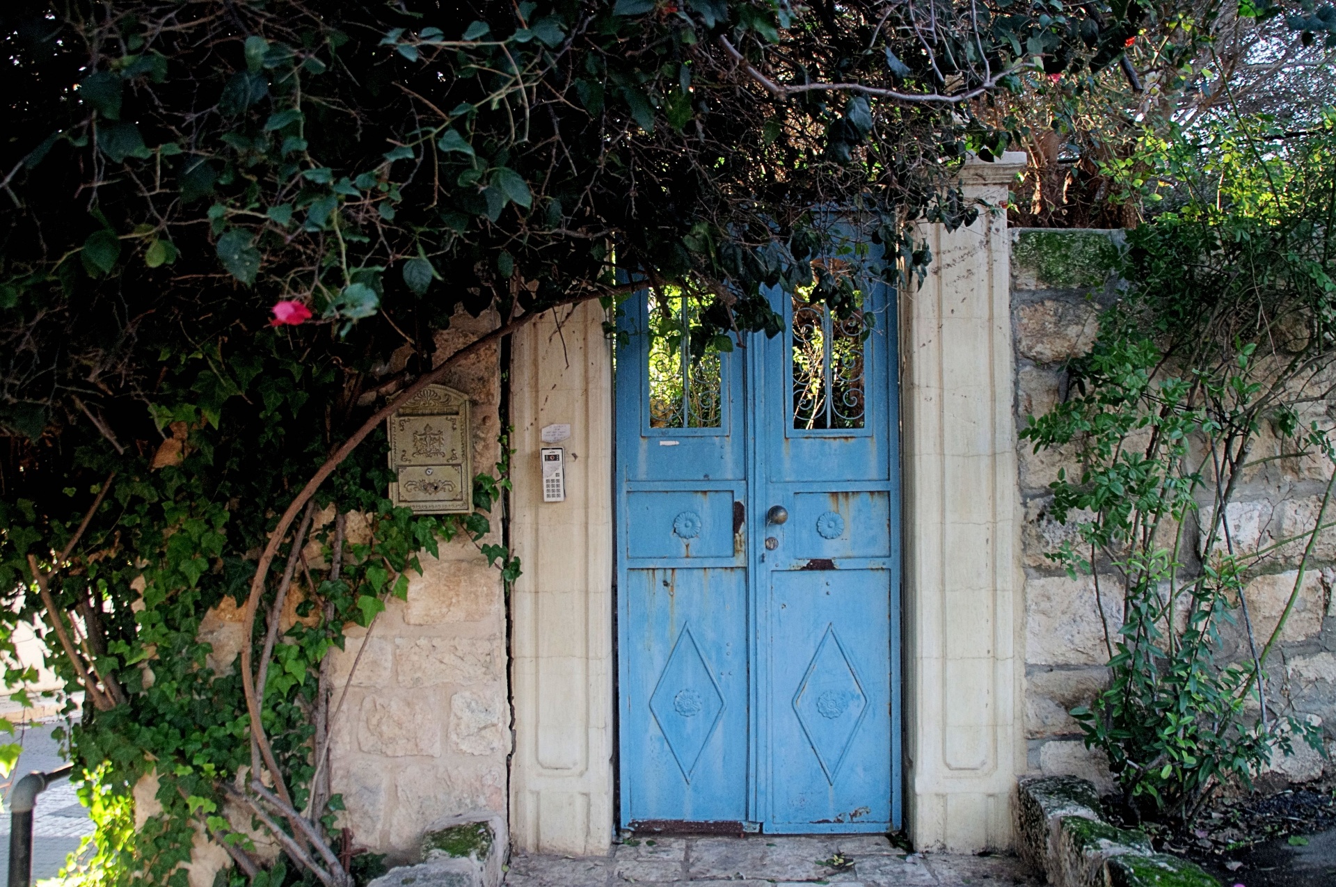 Blue door that leads to secret garden
