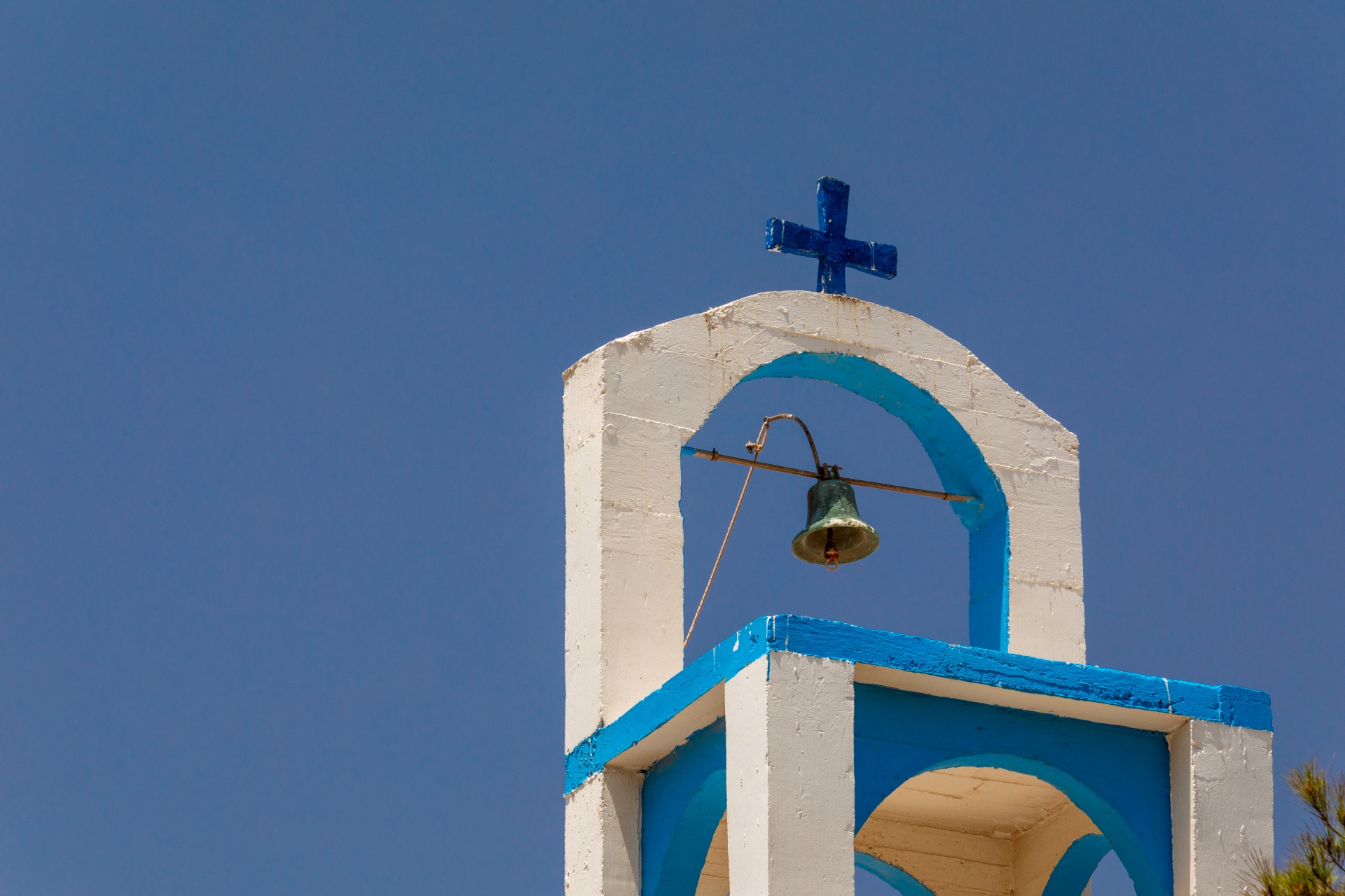 Greek church steeple with a bell