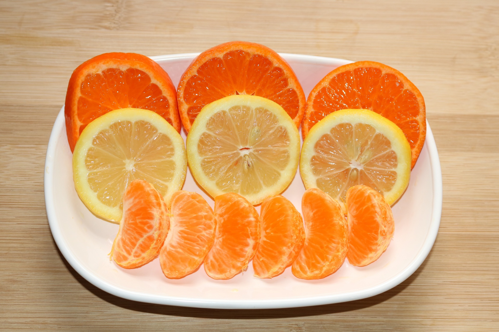Orange And Lemon Slices On Plate
