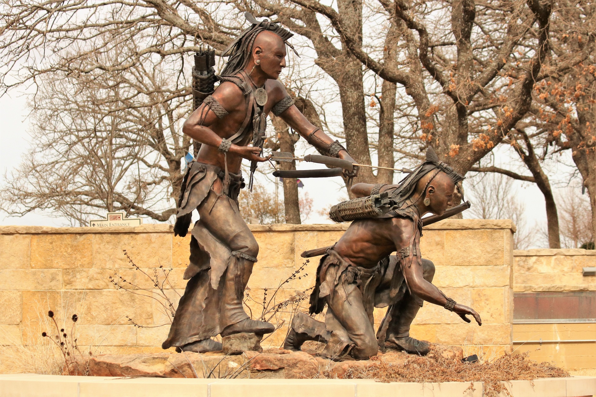 Two Native American Chickasaw warriors hunting sculptures at the Chickasaw Cultural Center in Sulphur, Oklahoma.