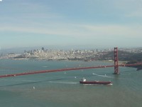 Golden Gate Bridge With Cargo Ship