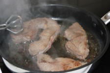 Steak Frying In A Pan