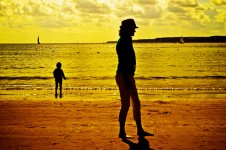 Woman, Child And Sea
