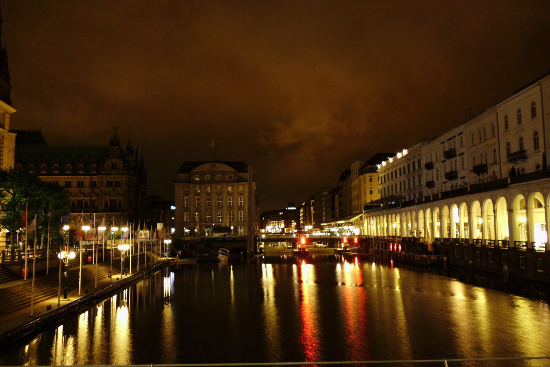 a night shot of the little alster in hamburg