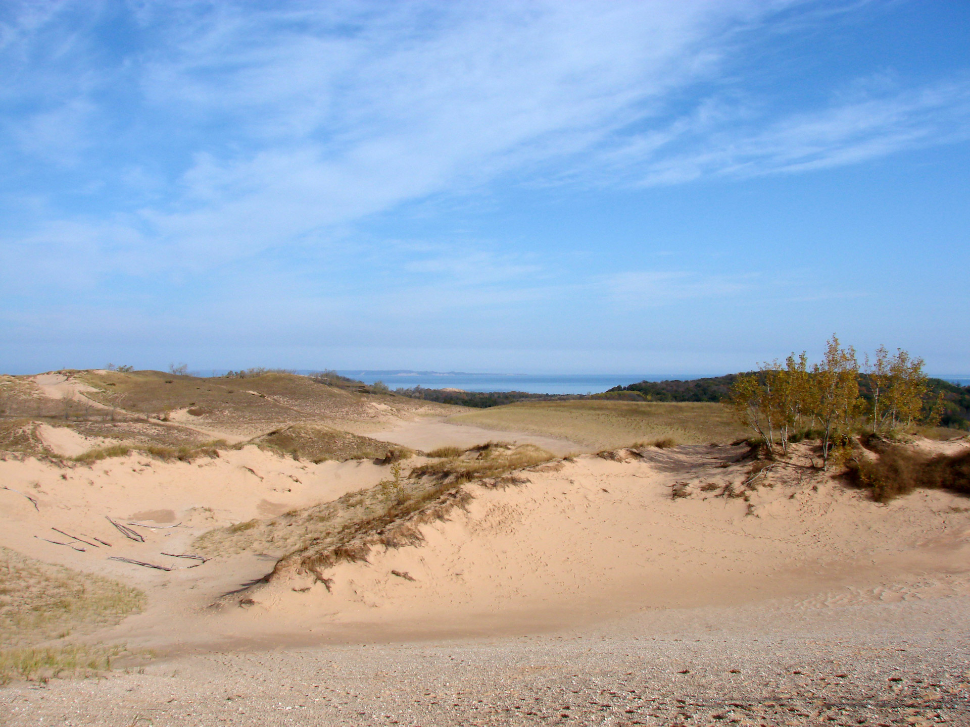 This photo shows the beautiful skies and sand near the Michigan shoreline.