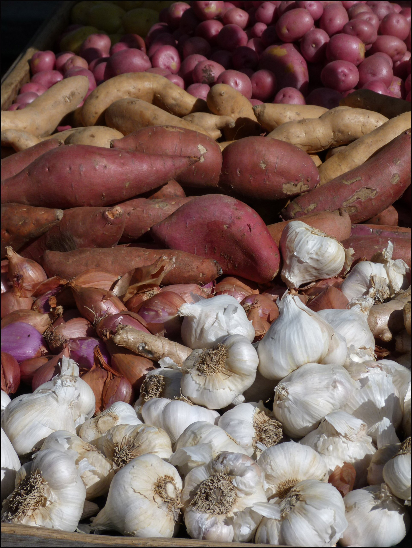 Mixed produce; garlic, yams, potatoes