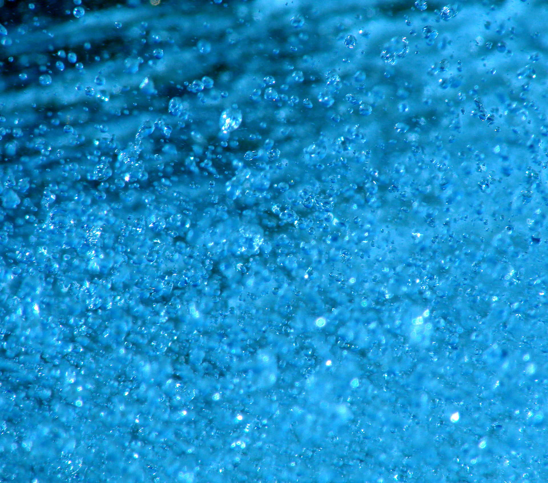 Water droplets kicked up by the boat as it cruises on Lake Truman in Missouri.