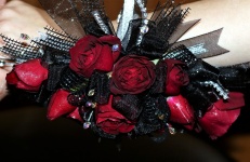 Black Corsage With Red Roses