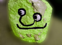 Face Painted On Rock