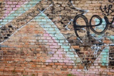 Graffiti On Old Brick Wall