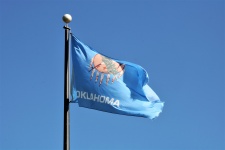 Oklahoma State Flag On Blue Sky