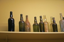 Row Of Vintage Bottles On A Shelf