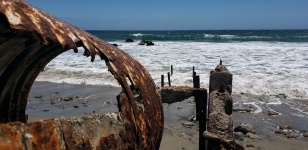 Rusty Pipe On Ocean Shore