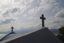 Two Christian Crosses On Roof
