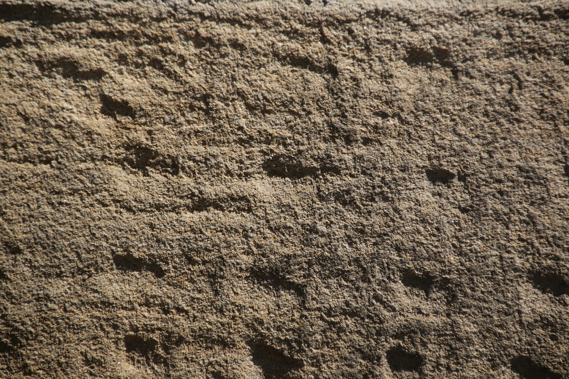 Dressed stonework in wall