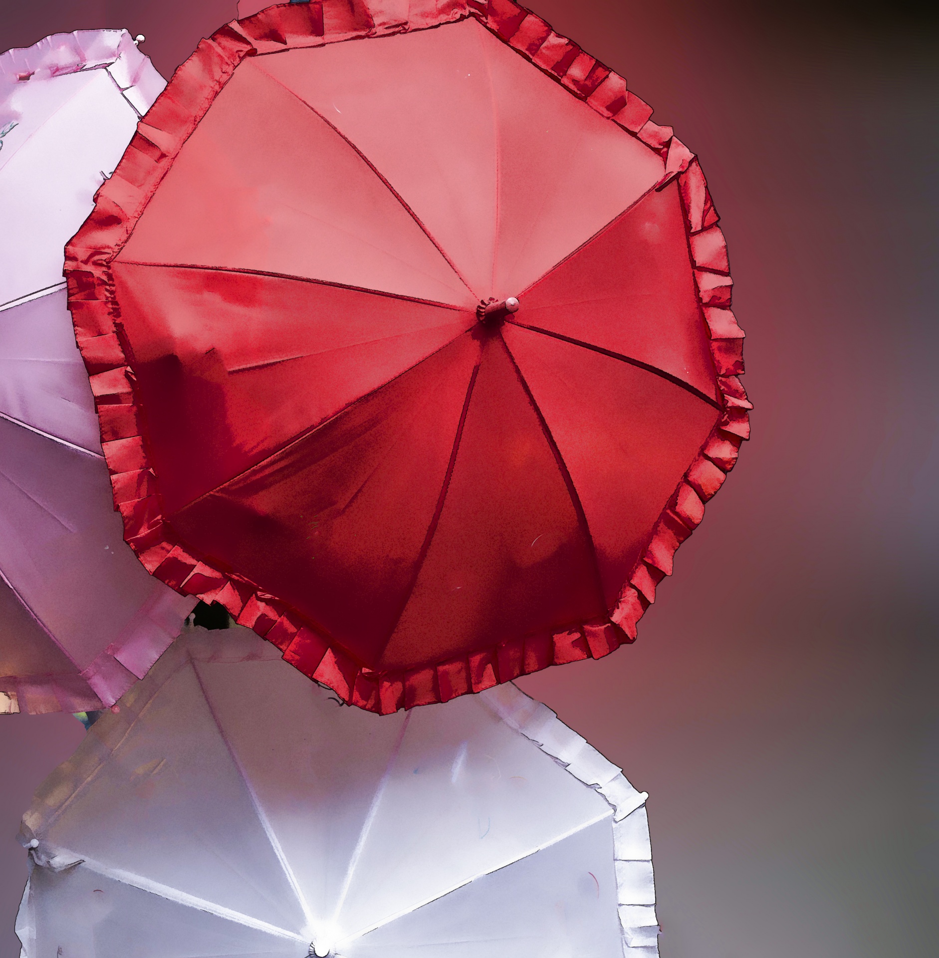 three frilly umbrellas with copy space