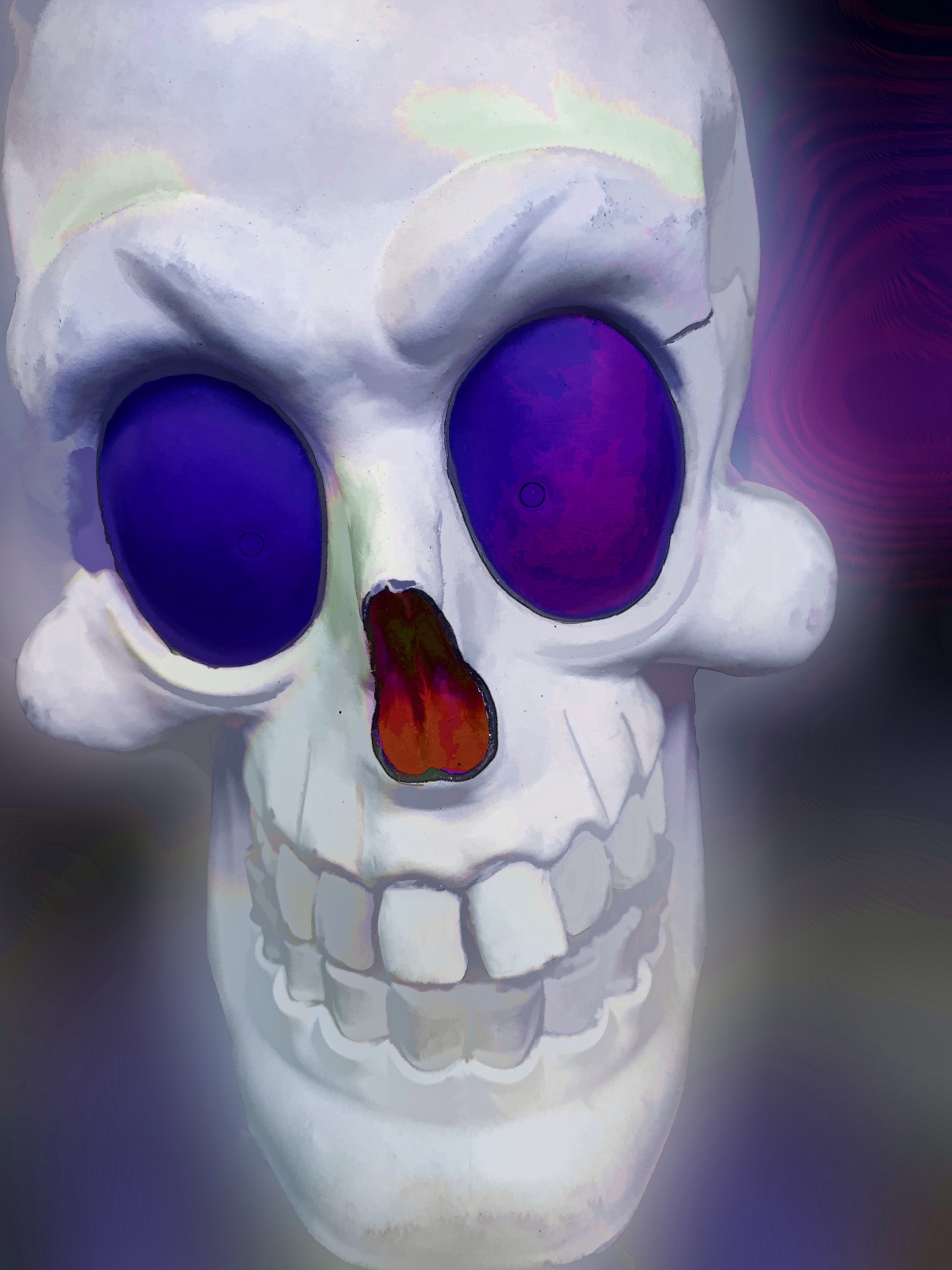 creepy skull head with purple eye sockets and red nose