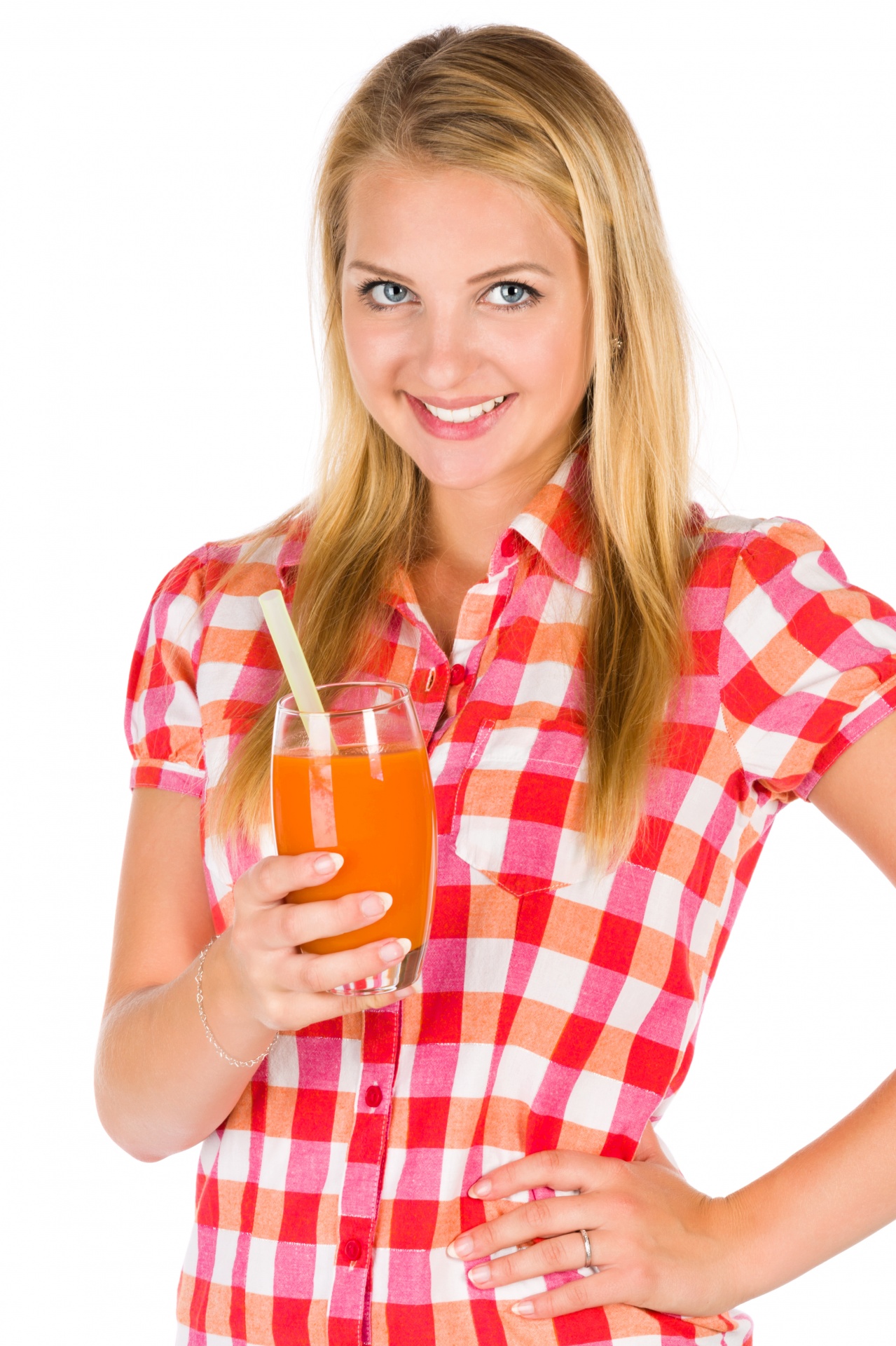 Young woman drinking carrot juice isolated on white background