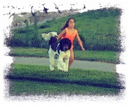 Child Running With Dog