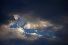 Gap Of Blue Sky Between Heavy Cloud