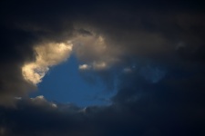 Gap With Blue Sky & Light On Cloud