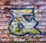 Graffiti On Brick Wall