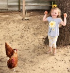 Little Girl Holding Chicken Eggs