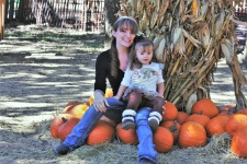 Mother And Child At Pumpkin Patch