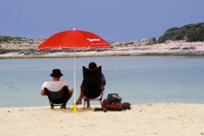 Red Umbrella On Beach